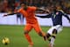 AMSTERDAM, NETHERLANDS - NOVEMBER 19: Luciano Narsingh of Netherlands in action with Pablo Armero of Colombia during the friendly International match between the Netherlands and Colombia at the Amsterdam Arena on November 19, 2013 in Amsterdam, Netherlan