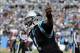 Dec 1, 2013; Charlotte, NC, USA; Carolina Panthers quarterback Cam Newton celebrates after scoring a touchdown during the first half of the game against the Tampa Bay Buccaneers at Bank of America Stadium. Mandatory Credit: Sam Sharpe-USA TODAY Sports