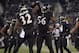 BALTIMORE, MD - NOVEMBER 28: Strong safety James Ihedigbo #32 and inside linebacker Josh Bynes #56 of the Baltimore Ravens celebrate a play against the Pittsburgh Steelers at M&T Bank Stadium on November 28, 2013 in Baltimore, Maryland. The Baltimore Rave