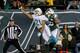 EAST RUTHERFORD, NJ - DECEMBER 1: Brent Grimes #21 of the Miami Dolphins breaks up a pass intended for David Nelson #86 of the New York Jets during their game at MetLife Stadium on December 1, 2013 in East Rutherford, New Jersey. (Photo by Jeff Zelevan