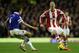 LIVERPOOL, ENGLAND - NOVEMBER 30: Brek Shea of Stoke City attempts to move past Phil Jagielka of Everton during the Barclays Premier League match between Everton and Stoke City at Goodison Park on November 30, 2013 in Liverpool, England. (Photo by Clive