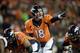 Nov 17, 2013; Denver, CO, USA; Denver Broncos quarterback Peyton Manning (18) checks off near the end zone in the first quarter against the Kansas City Chiefs at Sports Authority Field at Mile High. Mandatory Credit: Ron Chenoy-USA TODAY Sports