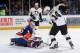UNIONDALE, NY - DECEMBER 03: Chris Kunitz #14 of the Pittsburgh Penguins looks for a rebound from Anders Nilsson #45 of the New York Islanders at the Nassau Veterans Memorial Coliseum on December 3, 2013 in Uniondale, New York. The Penguins defeated the
