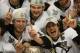 DETROIT - JUNE 12: (L-R) Jordan Staal #11, Chris Kunitz #14 and Sidney Crosby #87 of the Pittsburgh Penguins celebrate with the Stanley Cup after defeating the Detroit Red Wings by a score of 2-1 to win Game Seven and the 2009 NHL Stanley Cup Finals at Jo