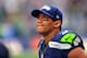 SEATTLE, WA - SEPTEMBER 22: Quarterback Russell Wilson #3 of the Seattle Seahawks watches from the sidelines as the clock winds down during the fourth quarter of the game against the Jacksonville Jaguars at CenturyLink Field on September 22, 2013 in Seatt