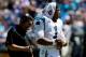CHARLOTTE, NC - SEPTEMBER 22: Cam Newton #1 of the Carolina Panthers and his head coach Ron Rivera watch on against the New York Giants during their game at Bank of America Stadium on September 22, 2013 in Charlotte, North Carolina. (Photo by Streeter