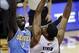 Dec 4, 2013; Cleveland, OH, USA; Denver Nuggets power forward J.J. Hickson (7) defends a shot by Cleveland Cavaliers center Andrew Bynum (21) in the second quarter at Quicken Loans Arena. Mandatory Credit: David Richard-USA TODAY Sports