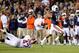 Nov 30, 2013; Auburn, AL, USA; Auburn Tigers quarterback Nick Marshall (14) throws for a touchdown against Alabama Crimson Tide linebacker Xzavier Dickson (47) during the fourth quarter at Jordan Hare Stadium. Mandatory Credit: John David Mercer-USA TODAY