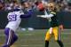 GREEN BAY, WI - NOVEMBER 24: Matt Flynn #10 of the Green Bay Packers passes over Jared Allen #69 of the Minnesota Vikings at Lambeau Field on November 24, 2013 in Green Bay, Wisconsin. The Vikings and the Packers tied 26-26 after overtime. (Photo by Jona