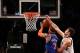 Nov. 26, 2012; Brooklyn, NY, USA; Brooklyn Nets center Brook Lopez (11) blocks a shot by New York Knicks small forward Carmelo Anthony (7) during the second half at the Barclays Center. Nets won in overtime 96-89. Mandatory Credit: Debby Wong-USA TODAY Sp