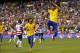 May 30, 2012; Landover, MD, USA; Brazil forward Neymar (11) celebrates after scoring a goal on a penalty kick against the USA in the first half at FedEx Field. Mandatory Credit: Geoff Burke-USA TODAY Sports