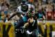 JACKSONVILLE, FL - DECEMBER 05: Chad Henne #7 of the Jacksonville Jaguars scrambles for yardage during the game against the Houston Texans at EverBank Field on December 5, 2013 in Jacksonville, Florida. (Photo by Sam Greenwood/Getty Images)