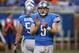 DETROIT, MI - NOVEMBER 24: Matthew Stafford #9 of the Detroit Lions gets ready to call the play in the huddle during the fourth quarter of the game against the Tampa Bay Buccaneers at Ford Field on November 24, 2013 in Detroit, Michigan. Tampa Bay defeat