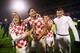 ZAGREB, CROATIA - NOVEMBER 19: Luka Modric, Vedran Corluka, Mateo Kovacic and Ante Rebic (L-R) of Croatia celebrate after the FIFA 2014 World Cup Qualifier play-off second leg match between Croatia and Iceland at Maksimir Stadium on November 19, 2013 in