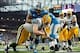 Nov 28, 2013; Detroit, MI, USA; Detroit Lions defensive tackle Ndamukong Suh (90) sacks Green Bay Packers quarterback Matt Flynn (10) in the end zone for a safety during the third quarter during a NFL football game on Thanksgiving at Ford Field. Mandatory