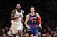 Dec 5, 2013; Brooklyn, NY, USA; New York Knicks power forward Andrea Bargnani (77) has words with Brooklyn Nets power forward Kevin Garnett (2) as they run up the court after Bargnani hits a three-point basket during the fourth quarter of a game at Barcla