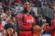 CHICAGO, IL - DECEMBER 5: LeBron James #6 of the Miami Heat smiles before the game against the Chicago Bulls on December 5, 2013 at United Center in Chicago, Illinois. NOTE TO USER: User expressly acknowledges and agrees that, by downloading and or using
