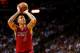MIAMI, FL - DECEMBER 03: Michael Beasley #8 of the Miami Heat shoots a free throw during a game against the Detroit Pistons at American Airlines Arena on December 3, 2013 in Miami, Florida. NOTE TO USER: User expressly acknowledges and agrees that, by do