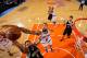 NEW YORK, NY - DECEMBER 19: Deron Williams #8 of the Brooklyn Nets drives to the basket against Tyson Chandler #6 of the New York Knicks on December 19, 2012 at Madison Square Garden in New York City. NOTE TO USER: User expressly acknowledges and agrees