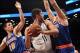 Dec 5, 2013; Brooklyn, NY, USA; Brooklyn Nets center Brook Lopez (11) controls the ball while defended by New York Knicks point guard Beno Udrih (18) and New York Knicks center Cole Aldrich (45) during the fourth quarter of a game at Barclays Center. Mand