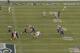 Justin Smith (left) and Ahmad Brooks (right) occupy multiple blockers so Aldon Smith (No. 99) can sack Wilson for an eight-yard loss.