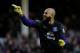 LIVERPOOL, ENGLAND - NOVEMBER 30: Tim Howard, Goalkeeper of Everton celebrates the opening goal during the Barclays Premier League match between Everton and Stoke City at Goodison Park on November 30, 2013 in Liverpool, England. (Photo by Jan Kruger/Get