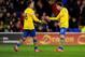 CARDIFF, WALES - NOVEMBER 30: Aaron Ramsey of Arsenal (16) is congratulated by Nacho Monreal as he scores their third goal during the Barclays Premier League match between Cardiff City and Arsenal at Cardiff City Stadium on November 30, 2013 in Cardiff,