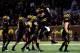 COLUMBIA, MO - NOVEMBER 30: Wide receiver L'Damian Washington #2 of the Missouri Tigers jumps into the arms of fellow players as the Missouri Tigers defeat the Texas A&M Aggies 28-21 to win the game on November 30, 2013 in Columbia, Missouri. (Photo by