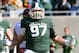 EAST LANSING, MI - NOVEMBER 30: Mark Scarpinato #97 of the Michigan State Spartans reacts after forcing Minnesota Golden Gophers quarterback Philip Nelson #9 to throw an incomplete pass in the second quarter of the game at Spartan Stadium on November 30,