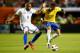 MIAMI GARDENS, FL - NOVEMBER 16: Neymar #10 of Brazil moves the ball around Wilson Palacios #8 of Honduras in the first half during a friendly match at Sun Life Stadium on November 16, 2013 in Miami Gardens, Florida. (Photo by Jared Wickerham/Getty Image