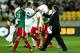 WELLINGTON, NEW ZEALAND - NOVEMBER 20: Coach Miguel Herrera of Mexico congratulates Paul Aguilar after the final whistle during leg 2 of the FIFA World Cup Qualifier match between the New Zealand All Whites and Mexico at Westpac Stadium on November 20, 2