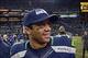 Dec 2, 2013; Seattle, WA, USA; Seattle Seahawks quarterback Russell Wilson (3) walks off the field after the game against the New Orleans Saints at CenturyLink Field. The Seahawks defeated the Saints 34-7. Mandatory Credit: Kirby Lee-USA TODAY Sports