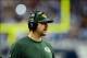 Nov 28, 2013; Detroit, MI, USA; Green Bay Packers quarterback Aaron Rodgers (12) on the sidelines during the first quarter of a NFL football game against the Detroit Lions on Thanksgiving at Ford Field. Mandatory Credit: Andrew Weber-USA TODAY Sports