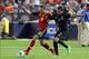 Jun 11, 2013; Bronx, NY, USA; Spain defender Jordi Alba (18) and Republic of Ireland defender Seamus Coleman (2) fight for the ball during the second half of a friendly match at Yankee Stadium. Spain defeated the Republic of Ireland 2-0. Mandatory Credit: