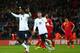 LONDON, ENGLAND - OCTOBER 11: Daniel Sturridge of England celebrates with Wayne Rooney of England after scoring from penalty spot during the FIFA 2014 World Cup Qualifying Group H match between England and Montenegro at Wembley Stadium on October 11, 201