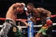 ANAHEIM, CA - DECEMBER 03: Abner Mares (L) throws a right hand at Joseph Agbeko of Ghana at Honda Center on December 3, 2011 in Anaheim, California. (Photo by Jeff Gross/Getty Images)