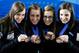 RIGA, LATVIA - MARCH 24: (L-R) Rachel Homan, Emma Miskew, Alison Kreviazuk and Lisa Weagle of Canada pose with the their medals after winning the bronze medal on Day 9 of the Titlis Glacier Mountain World Women's Curling Championship at the Volvo Sports