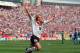 17 JUN 1994: JUERGEN KLINSMANN OF GERMANY CELEBRATES AFTER SCORING THE ONLY GOAL AGAINST BOLIVIA IN THE OPENING GAME OF THE 1994 WORLD CUP AT SOLDIER FIELD IN CHICAGO, ILLINOIS. Mandatory Credit: Shaun Botterill/ALLSPORT