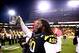 Nov 30, 2013; Tempe, AZ, USA; Arizona State Sun Devils defensive tackle Will Sutton celebrates with the trophy after defeating the Arizona Wildcats in the 87th annual Territorial Cup at Sun Devil Stadium. Arizona State defeated Arizona 58-21. Mandatory Cr