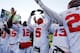 ANN ARBOR, MI - NOVEMBER 30: Quarterback Braxton Miller #5 of the Ohio State Buckeyes celebrates on the field with quarterback Kenny Guiton #13 and quarterback Cardale Jones #12 after defeating the Michigan Wolverines 42-41 in a game at Michigan Stadium