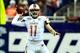 Dec 6, 2013; Detroit, MI, USA; Bowling Green Falcons quarterback Matt Johnson (11) throws a pass on the run during the second quarter against the Northern Illinois Huskies at Ford Field. Mandatory Credit: Andrew Weber-USA TODAY Sports