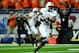 Dec 6, 2013; Detroit, MI, USA; Bowling Green Falcons wide receiver Ronnie Moore (5) makes a catch and runs for a touchdown during the first quarter against the Northern Illinois Huskies at Ford Field. Mandatory Credit: Andrew Weber-USA TODAY Sports