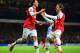 LONDON, ENGLAND - DECEMBER 04: Mesut Oezil of Arsenal celebrates his goal with Nacho Monreal of Arsenal during the Barclays Premier League match between Arsenal and Hull City at Emirates Stadium on December 4, 2013 in London, England. (Photo by Jamie Mc