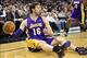 Dec 6, 2013; Sacramento, CA, USA; Los Angeles Lakers center Pau Gasol (16) looks to pass the ball from the floor against the Sacramento Kings during the second quarter at Sleep Train Arena. Mandatory Credit: Kelley L Cox-USA TODAY Sports