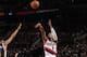 PORTLAND, OR - DECEMBER 6: Damian Lillard #0 of the Portland Trail Blazers shoots against the Utah Jazz on December 6, 2013 at the Moda Center Arena in Portland, Oregon. NOTE TO USER: User expressly acknowledges and agrees that, by downloading and or usin