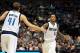 Dec 3, 2013; Dallas, TX, USA; Dallas Mavericks guard Monta Ellis (11) celebrates with forward Dirk Nowitzki (41) after a basket in the fourth quarter against the Charlotte Bobcats at American Airlines Center. The Mavs beat the Bobcats 89-82. Mandatory Cr