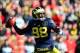 Nov 30, 2013; Ann Arbor, MI, USA; Michigan Wolverines quarterback Devin Gardner (98) looks to pass during the third quarter against the Ohio State Buckeyes at Michigan Stadium. Mandatory Credit: Andrew Weber-USA TODAY Sports