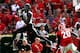 ATHENS, GA - OCTOBER 12: Dorial Green-Beckham #15 of the Missouri Tigers pulls in this reception against Shaq Wiggins #6 and Quincy Mauger #20 of the Georgia Bulldogs at Sanford Stadium on October 12, 2013 in Athens, Georgia. (Photo by Kevin C. Cox/Gett