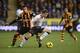 HULL, ENGLAND - DECEMBER 01: Jake Livermore (L) of Hull City tackles Jon Flanagan of Liverpool during the Barclays Premier League match between Hull City and Liverpool at KC Stadium on December 1, 2013 in Hull, England. (Photo by Jamie McDonald/Getty Im