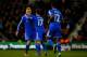 STOKE ON TRENT, ENGLAND - DECEMBER 07: Goalscorer Andre Schuerrle of Chelsea celebrates with teammates Eden Hazard and John Obi Mikel after scoring his team's second goal during the Barclays Premier League match between Stoke City and Chelsea at Britanni